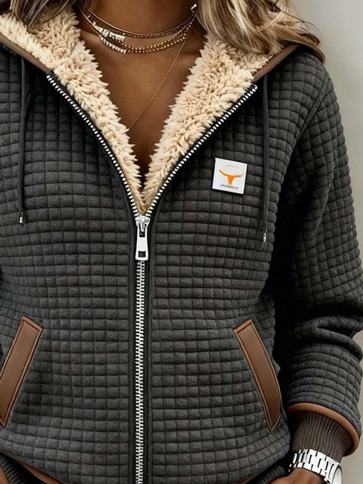 Sandra | Veste matelassée à capuche zippée avec doublure sherpa