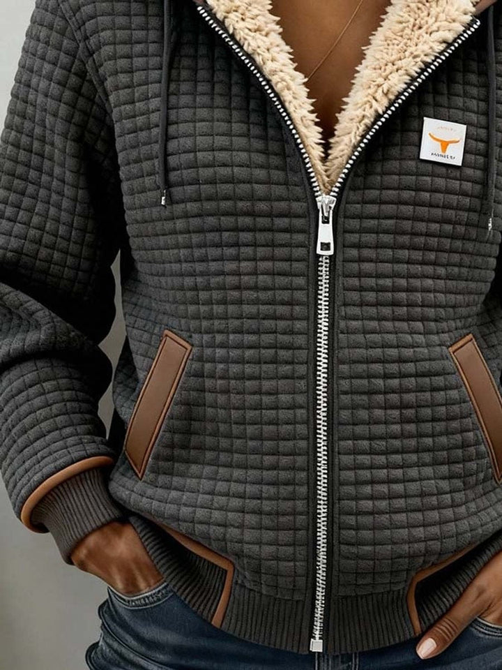 Sandra | Veste matelassée à capuche zippée avec doublure sherpa